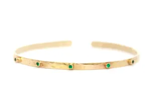14k yellow gold cuff bracelet with five 2mm Emeralds